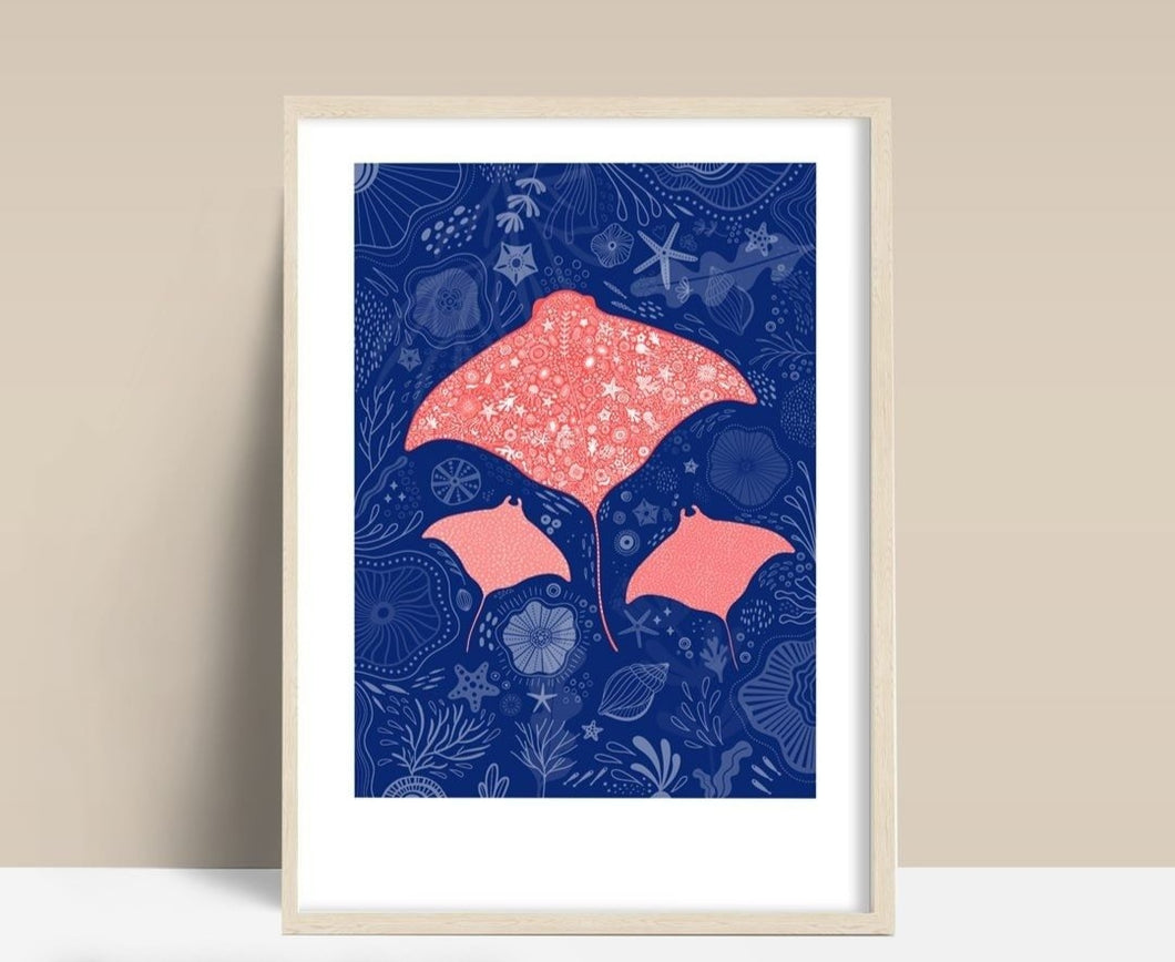 Pink Manta rays in the deep blue print